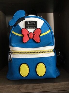 Loungefly Kids Donald Duck Inspired Blue Mini Backpack with Red Bow